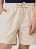 FLEX RELAXED SHORTS - BEIGE